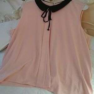 Peach poly top with classy black peter pan collar
